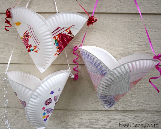 Super simple Valentine's Day craft for kids. Just need two cheap-o paper plates and ribbon. Kids could use them to collect their cards in class.