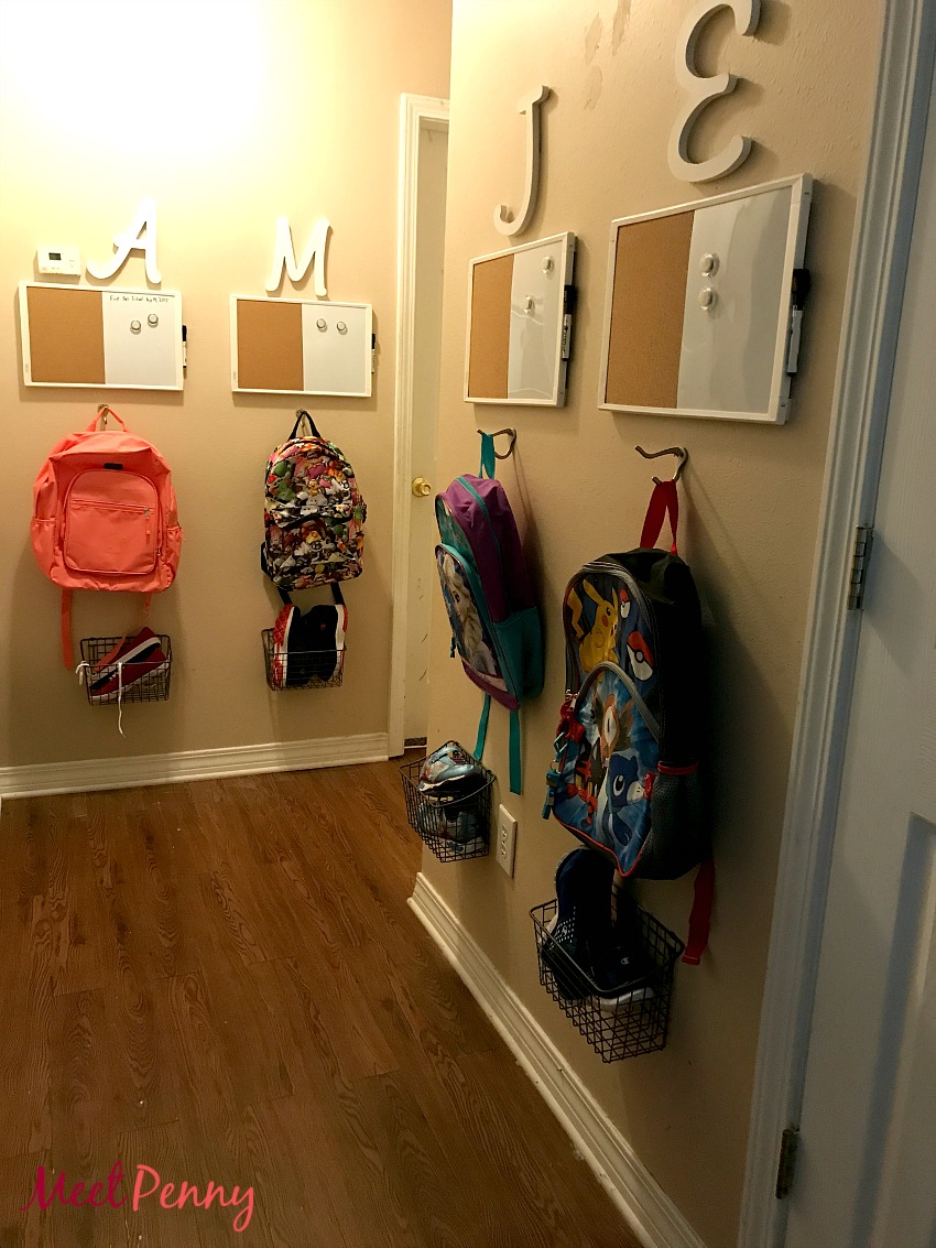 Back to school organization by creating a place for backpacks, shoes, and reminders for each child